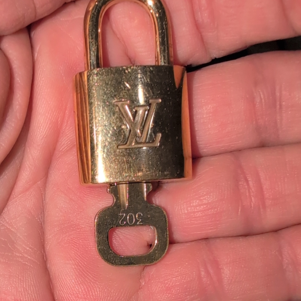 Louis Vuitton Shiny Brass Padlock with Key # 302